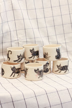 Czarki z czarnymi kotami