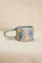 Ceramiczny kubek w uśmiechy