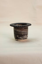 Marmurkowe, ceramiczne sitko na herbatę liściastą.